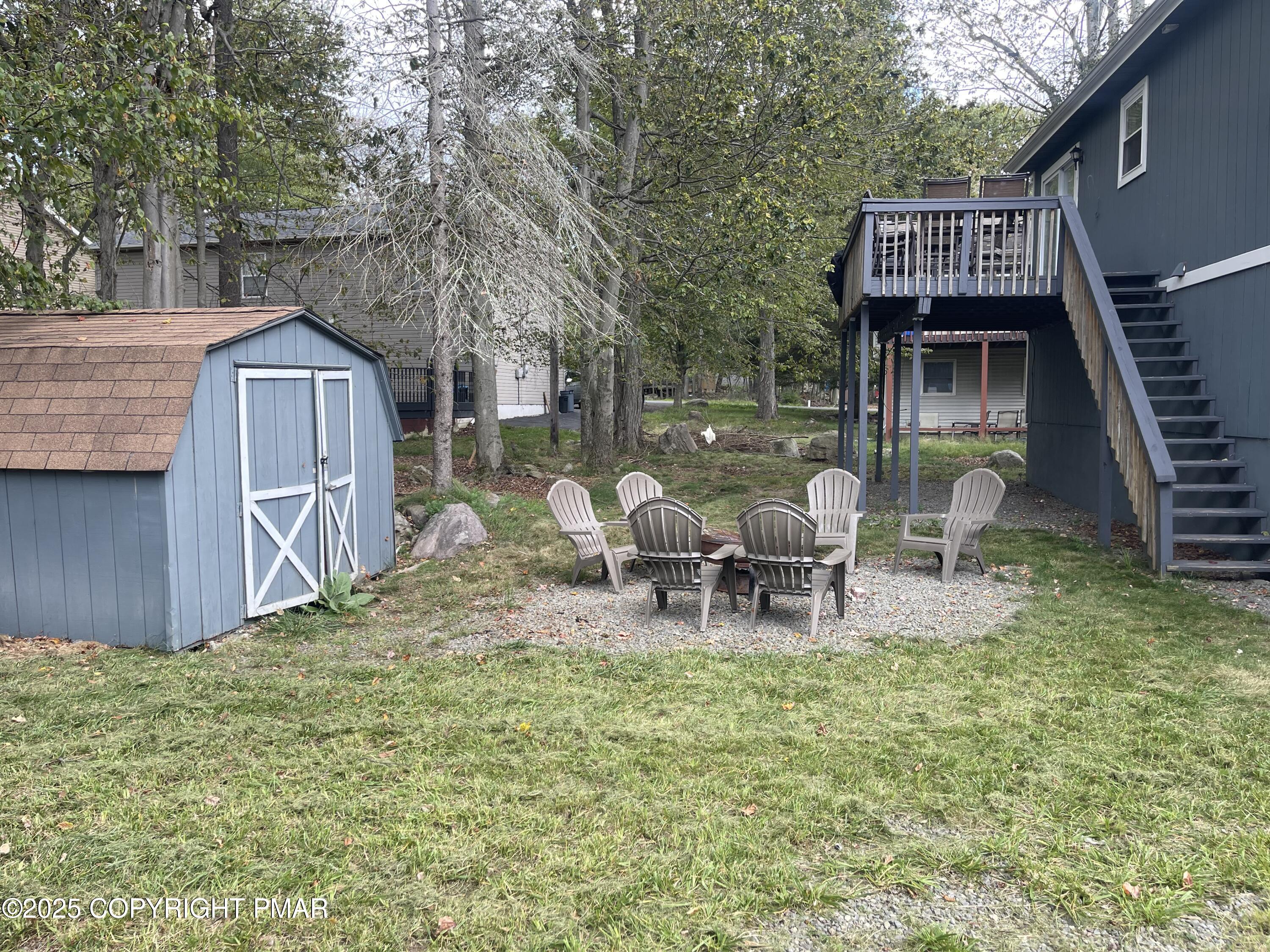 674 Country Pl Drive Tobyhanna, PA 18466 - Photo 17 of 17 a view of a house with a patio and a yard