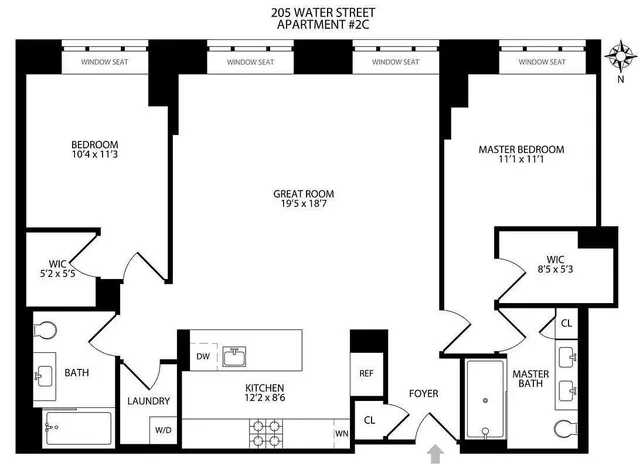 a bedroom with a bed a dresser and a window