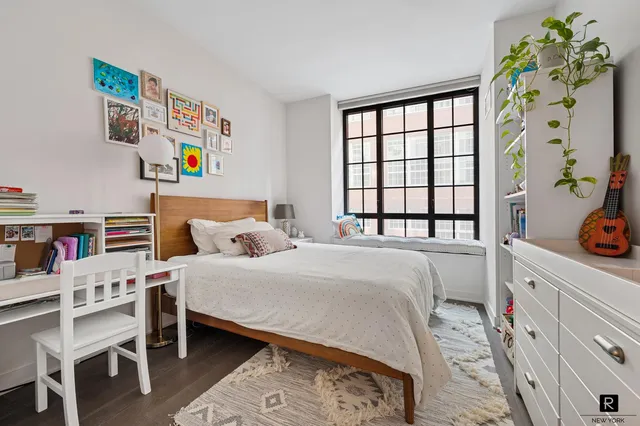a bathroom with a toilet a sink and bathtub