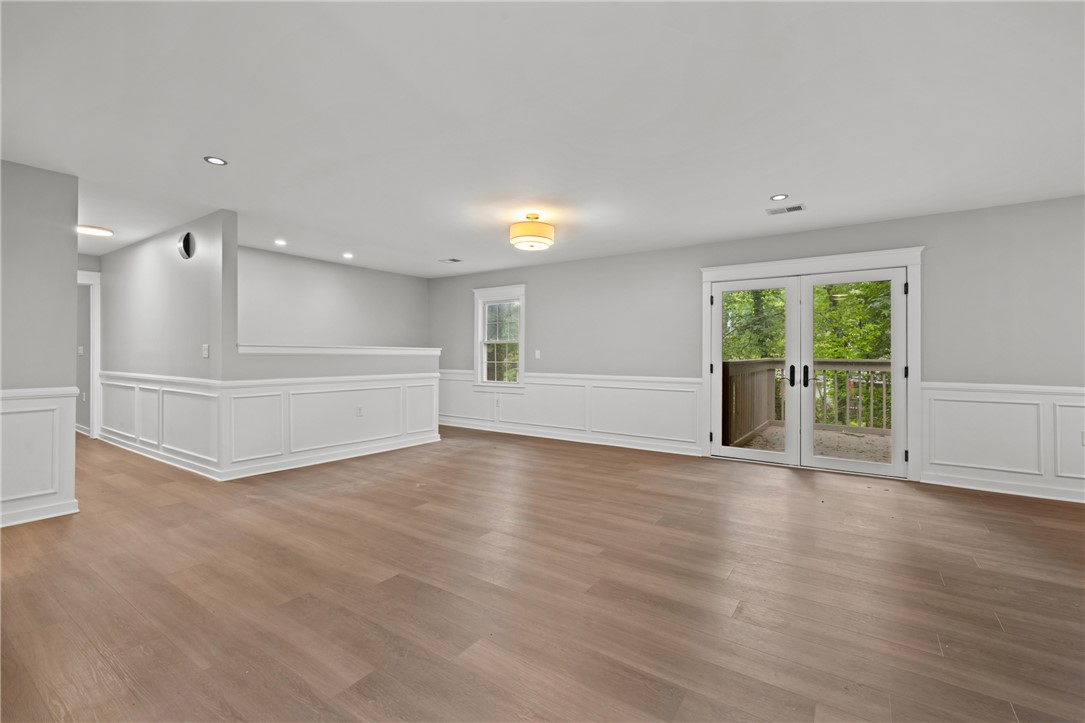 309 Woodland Way Clemson, SC 29631 - Photo 4 of 43 This expansive room offers natural light and a seamless connection to outdoor living.