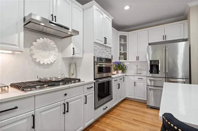 a view of deck with wooden floor and fence