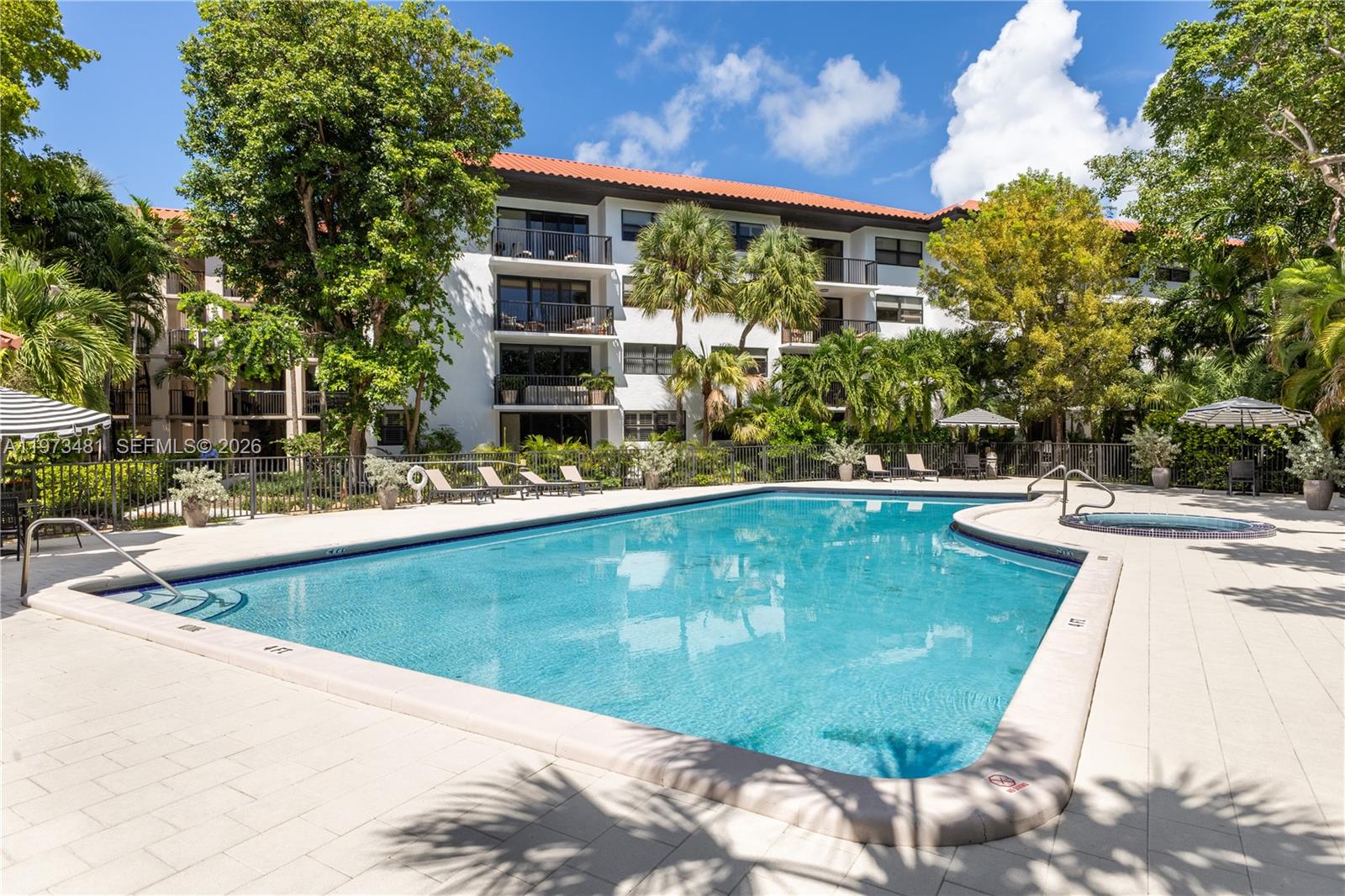 101 Ocean Ln Drive, Unit 1012 Key Biscayne, FL 33149 - Photo 32 of 39 a view of a swimming pool with a patio