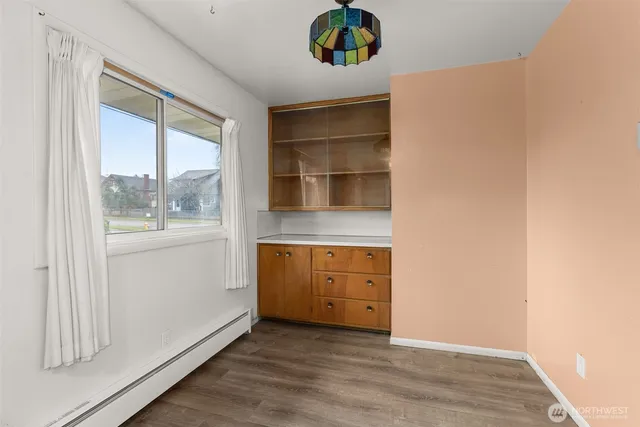 a view of a hallway with a door