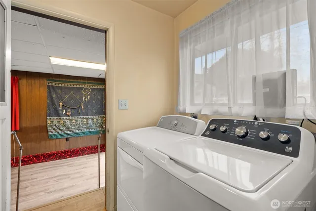 a view of hallway with a large mirror