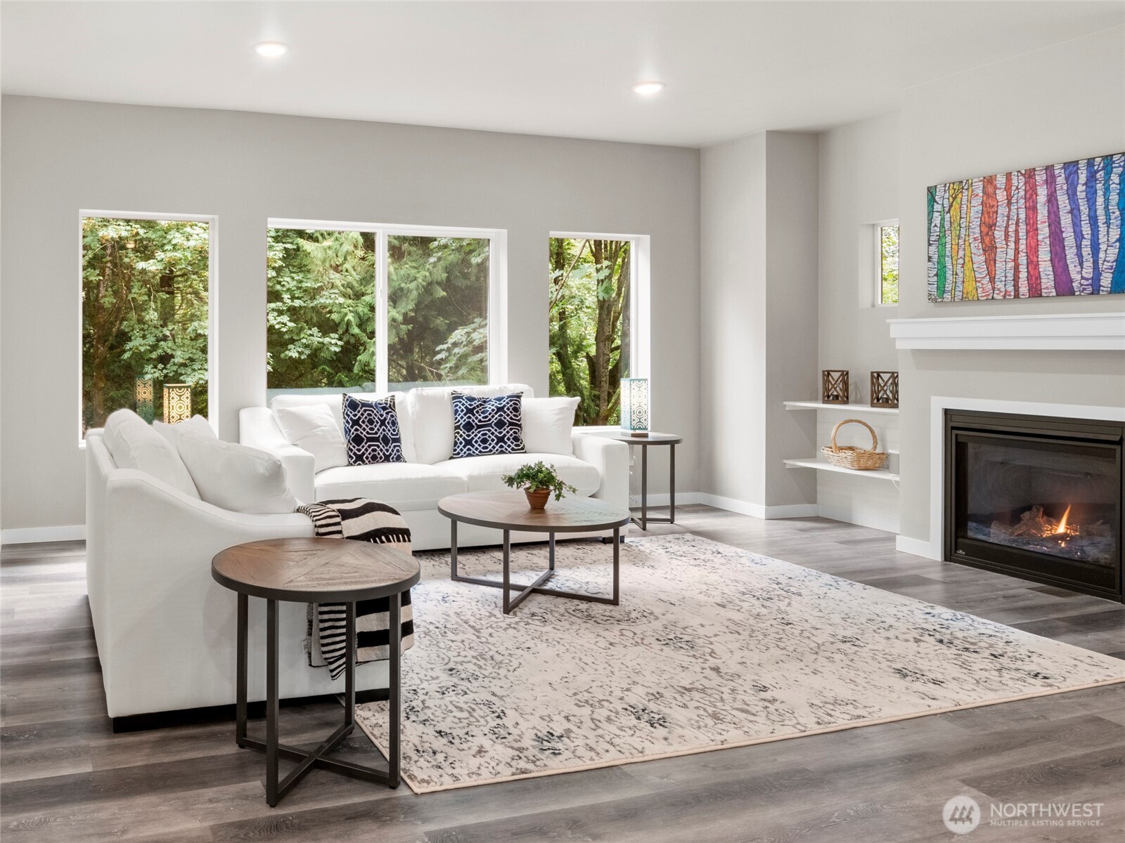 38 Harborview Drive Bellingham, WA 98229 - Photo 2 of 39 a living room with furniture a fireplace and a large window