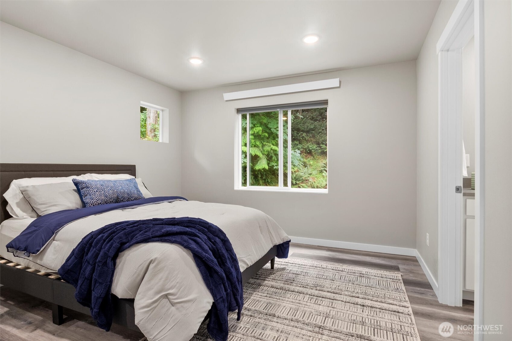 38 Harborview Drive Bellingham, WA 98229 - Photo 24 of 39 a bedroom with a bed and a window