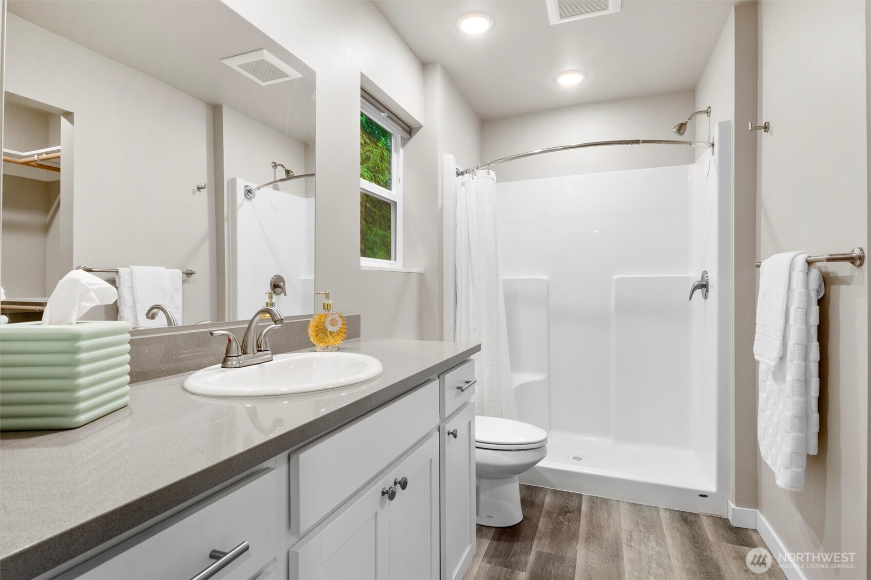 38 Harborview Drive Bellingham, WA 98229 - Photo 25 of 39 a bathroom with a sink a toilet and shower