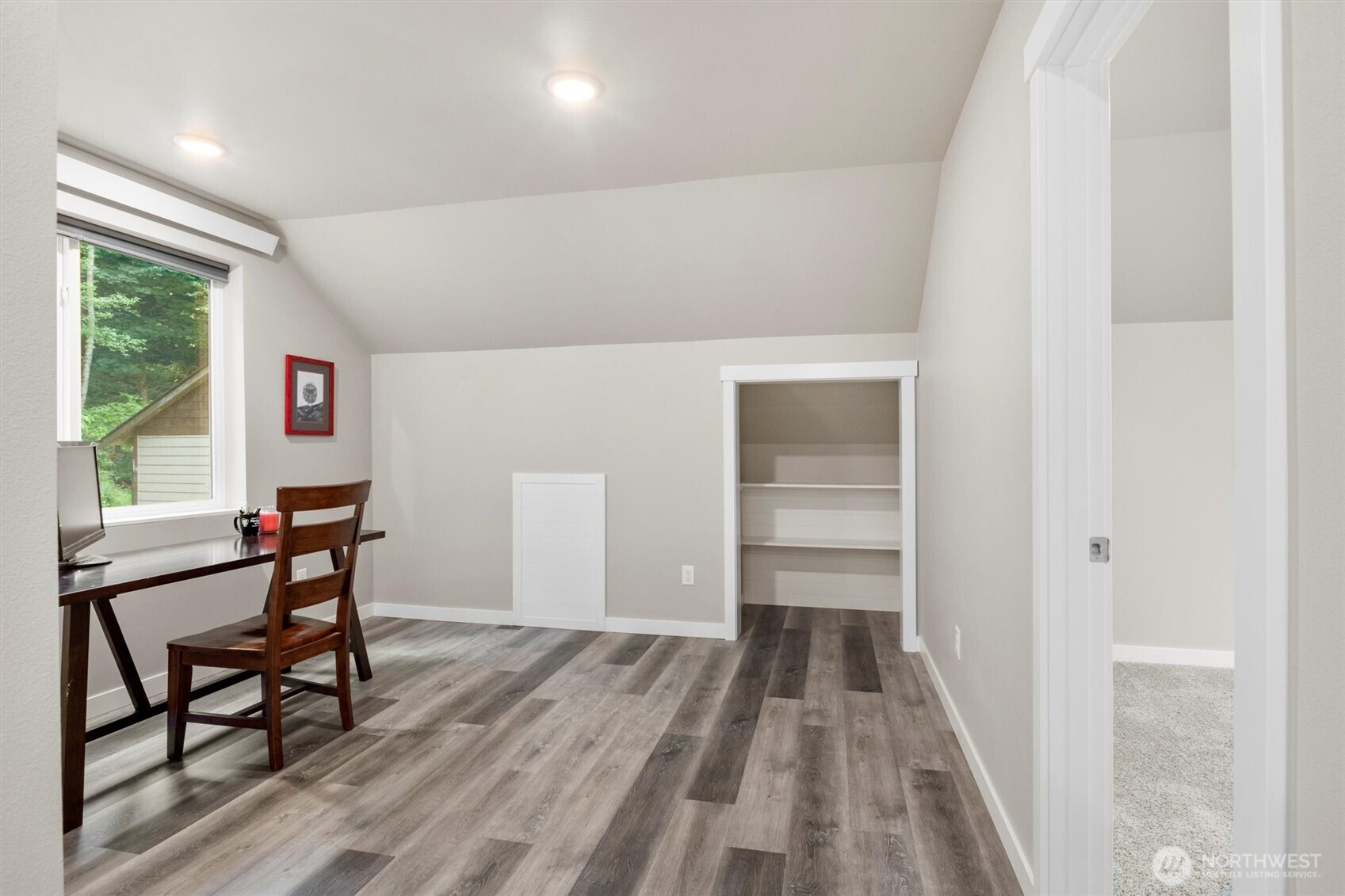 38 Harborview Drive Bellingham, WA 98229 - Photo 27 of 39 a view of a hallway with wooden floor and a window