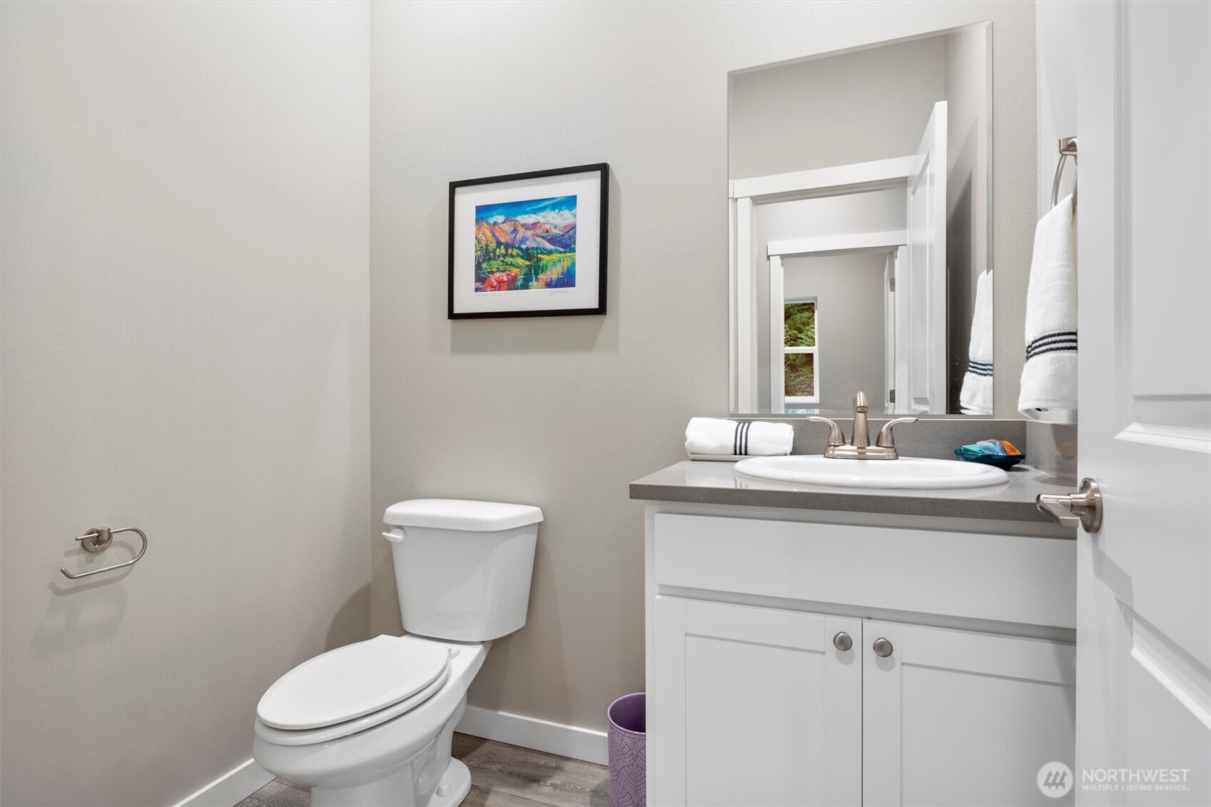 38 Harborview Drive Bellingham, WA 98229 - Photo 36 of 39 a bathroom with a toilet sink and mirror