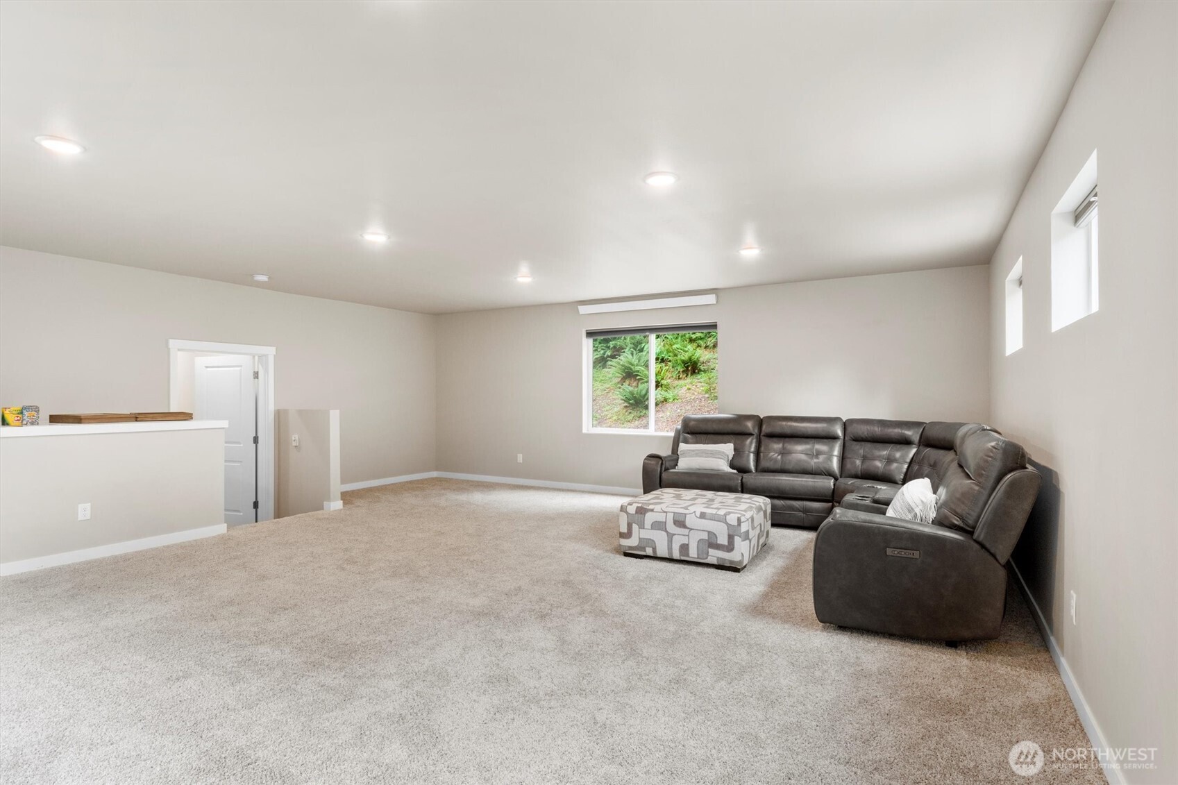 38 Harborview Drive Bellingham, WA 98229 - Photo 7 of 39 a living room with furniture and a window