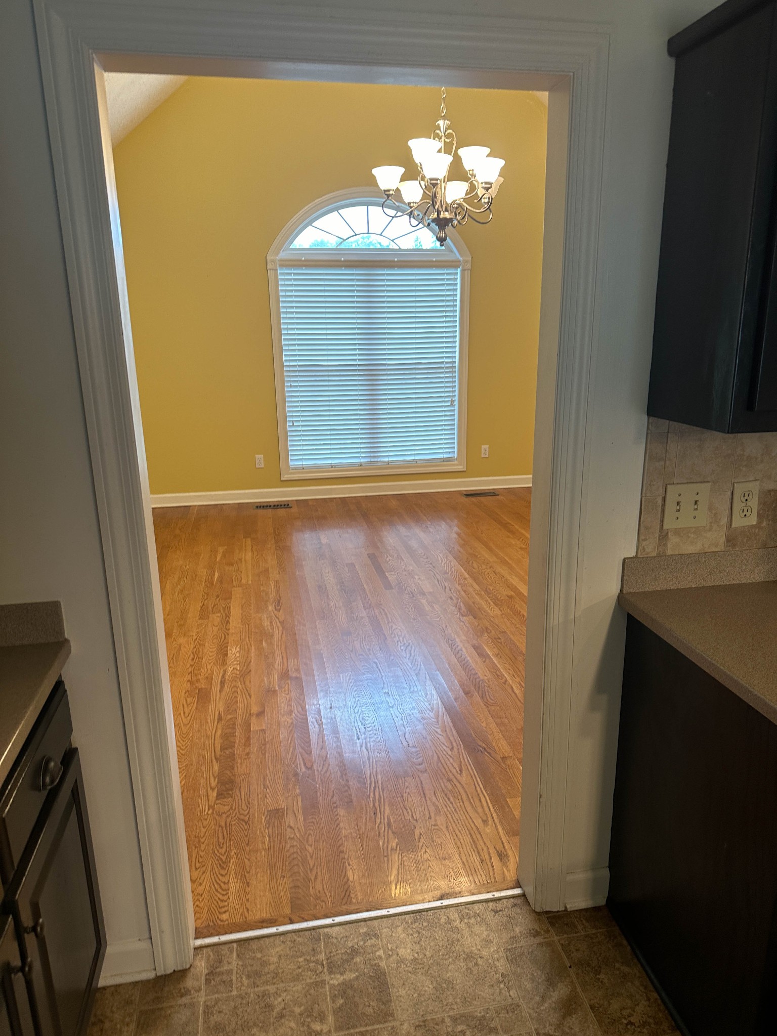 110 Post Road Manchester, TN 37355 - Photo 12 of 68 a view of a bathroom with a sink window and wooden floor