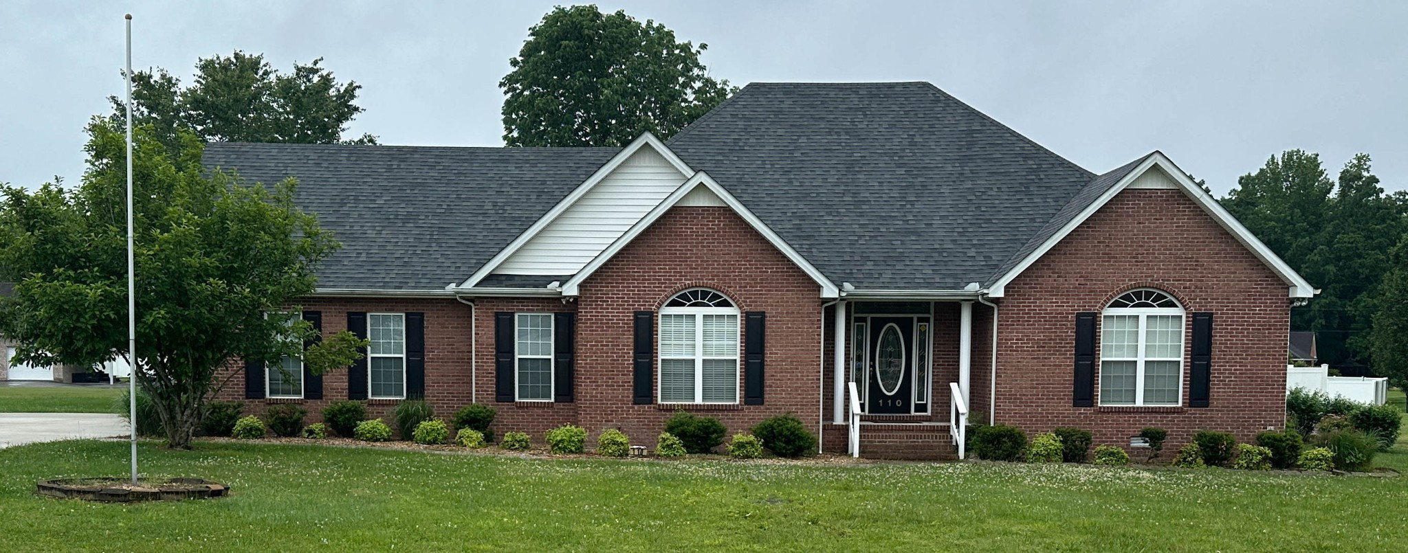 110 Post Road Manchester, TN 37355 - Photo 2 of 68 front view of a house with a yard