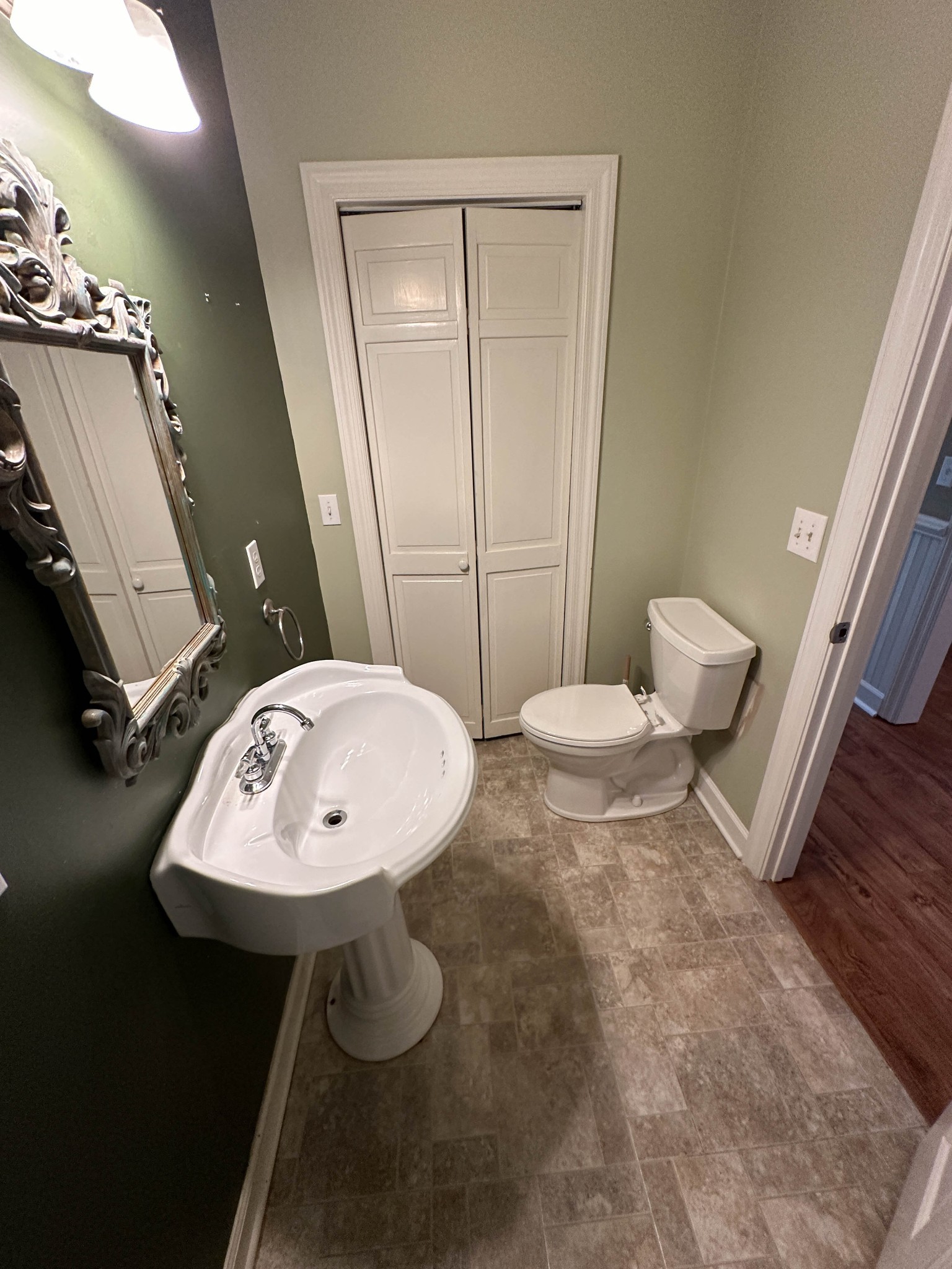 110 Post Road Manchester, TN 37355 - Photo 33 of 68 a bathroom with a toilet sink and mirror