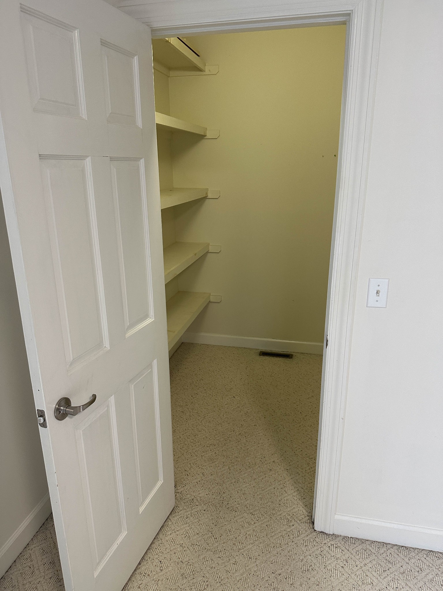 110 Post Road Manchester, TN 37355 - Photo 39 of 68 a view of walk in closet with empty racks