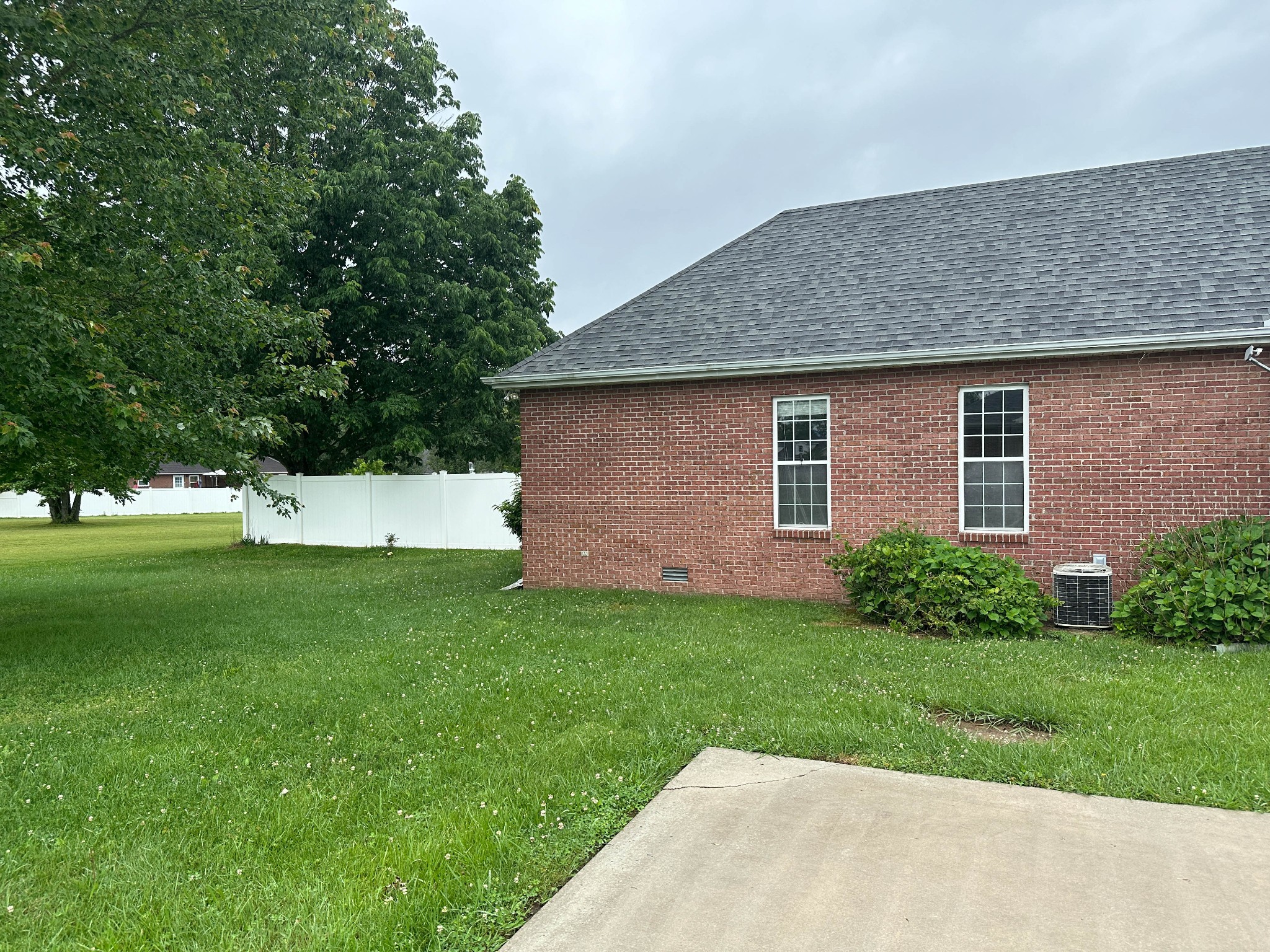 110 Post Road Manchester, TN 37355 - Photo 10 of 68 a front view of a house with a yard