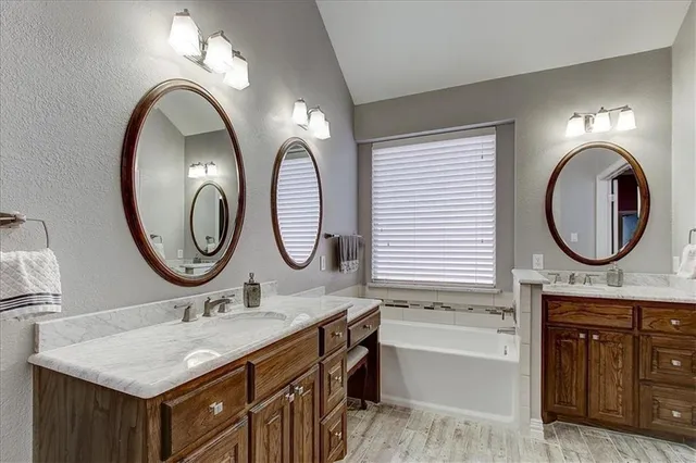 a room with furniture and a potted plant