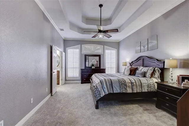 a bathroom with a double vanity sink toilet and shower