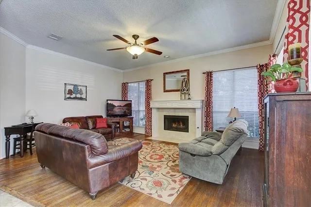 a view of living room with furniture and window