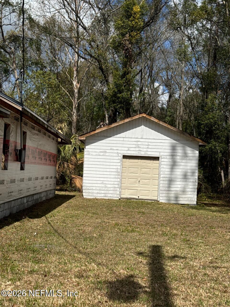 541 Highway 90 Baldwin, FL 32234 - Photo 6 of 14 a view of a house with a yard