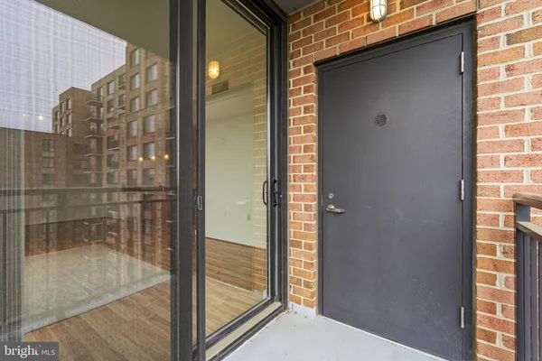 a view of a building with a street