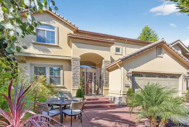 a front view of a house with a porch