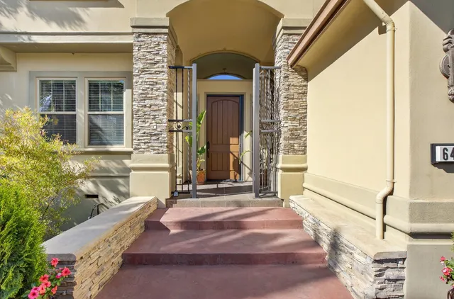 a view of a livingroom with furniture and front door