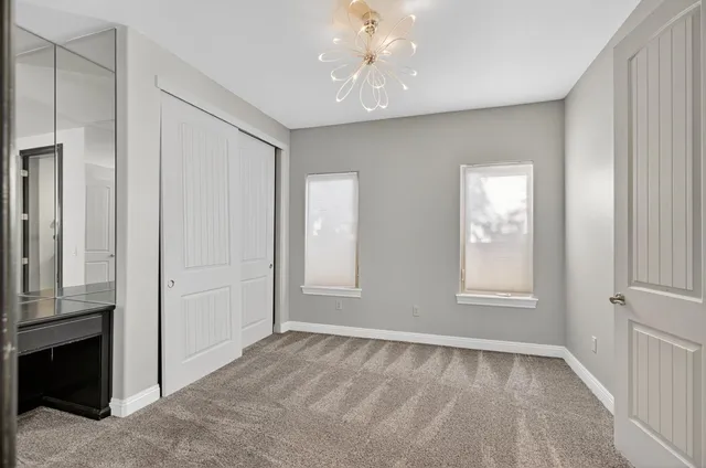 an aerial view of residential house with outdoor space and swimming pool