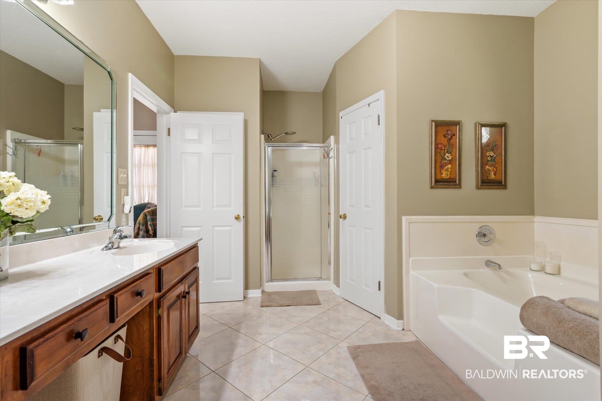 7360 Bridgewood Court Mobile, AL 36695 - Photo 16 of 30 Bathroom featuring vanity, shower with separate bathtub, and tile patterned flooring