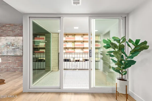 a window with a flower pot