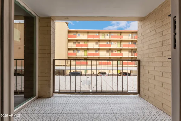 a view of a room with a large window