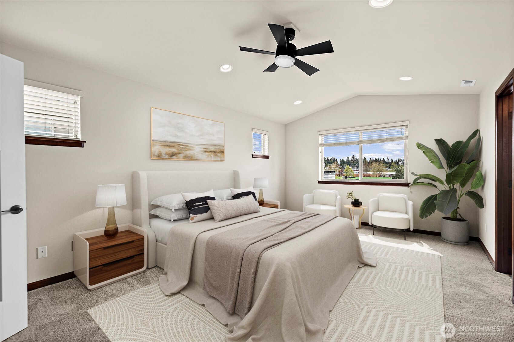 4708 167th Street Southwest Edmonds, WA 98026 - Photo 11 of 23 a bedroom with a bed a couch and a potted plant