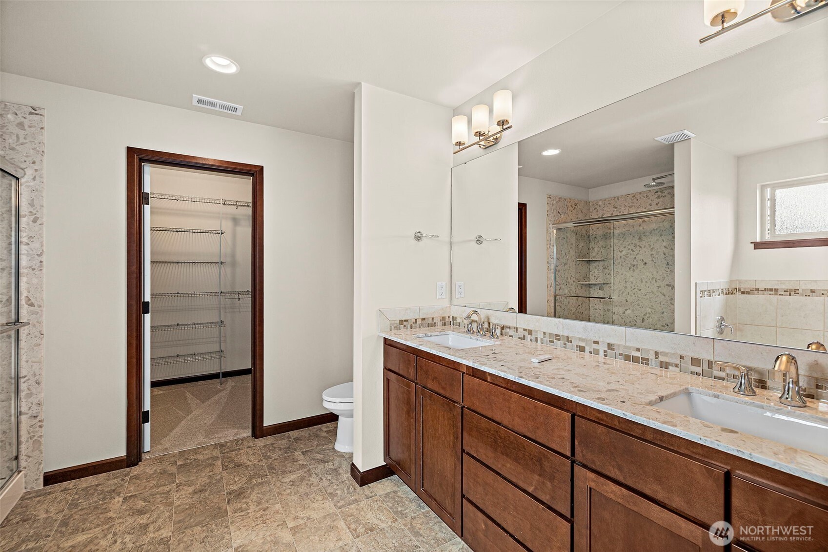 4708 167th Street Southwest Edmonds, WA 98026 - Photo 14 of 23 a bathroom with a granite countertop sink mirror and double