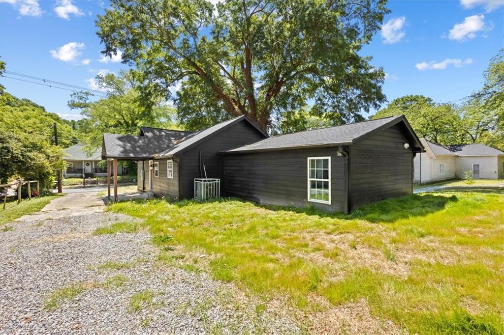 409 Calhoun Avenue Northeast Rome, GA 30161 - Photo 7 of 25 a house view with a outdoor space