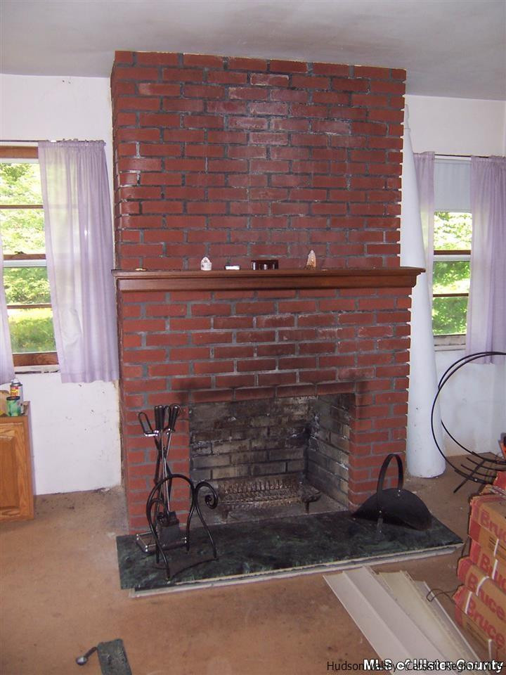 807 George Lawrence Road Roxbury, NY 12421 - Photo 6 of 8 a brick building with a sink and a window