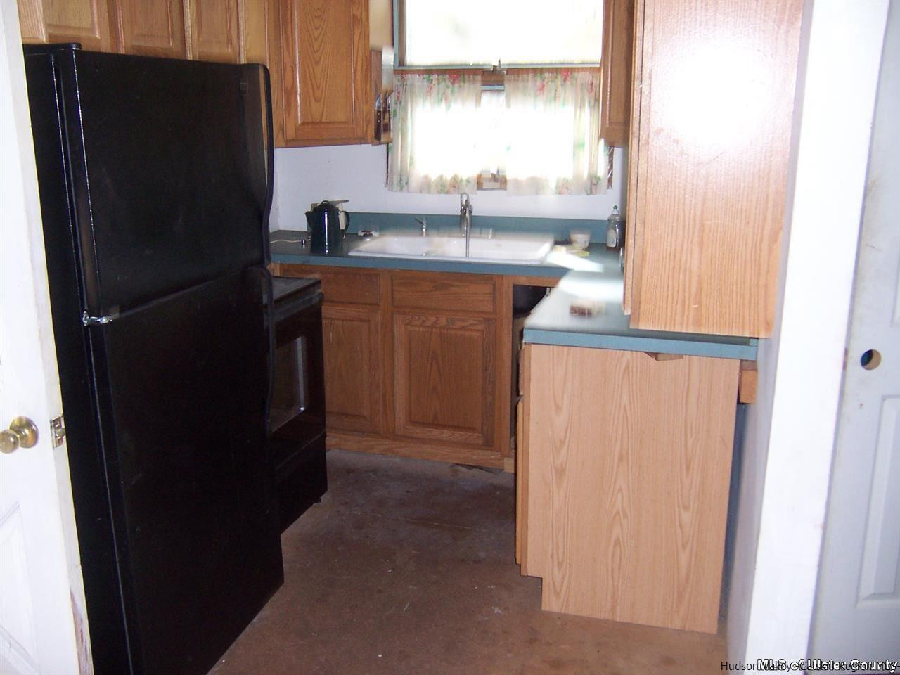 807 George Lawrence Road Roxbury, NY 12421 - Photo 8 of 8 a kitchen with a sink and a refrigerator