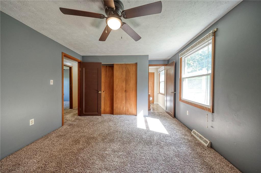 210 Swiontek Road Aliquippa, PA 15001 - Photo 14 of 28 wooden floor in an empty room with a window