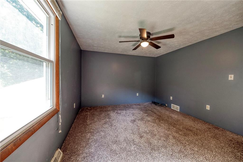 210 Swiontek Road Aliquippa, PA 15001 - Photo 15 of 28 a view of a room with a ceiling fan and window
