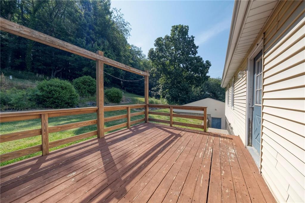 210 Swiontek Road Aliquippa, PA 15001 - Photo 22 of 28 a view of deck with a wooden floor and fence