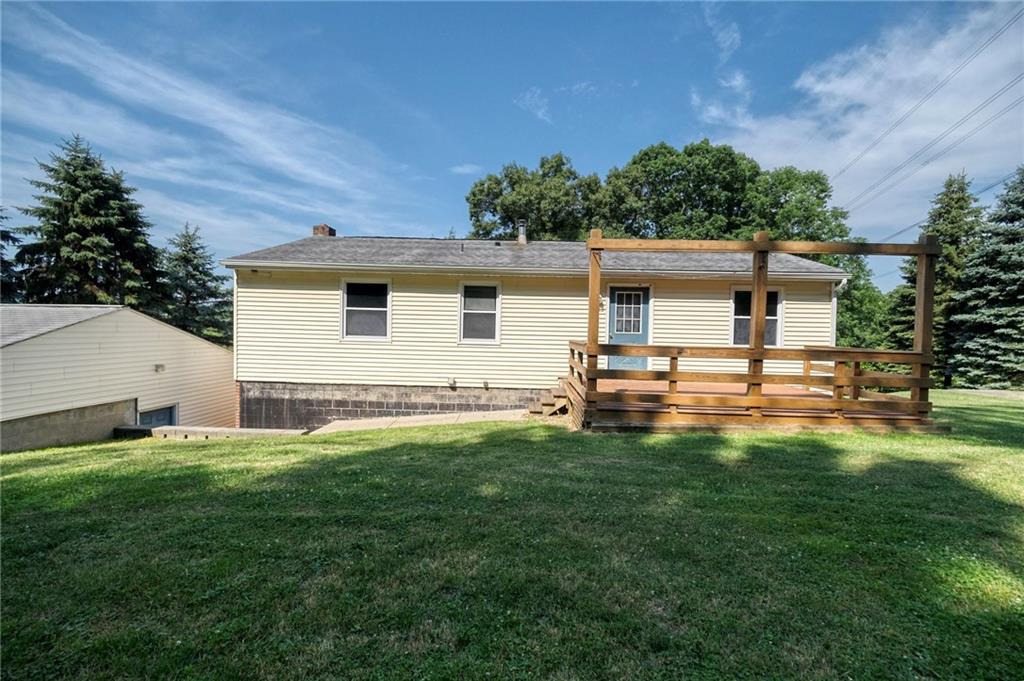 210 Swiontek Road Aliquippa, PA 15001 - Photo 23 of 28 a front view of house with yard and green space