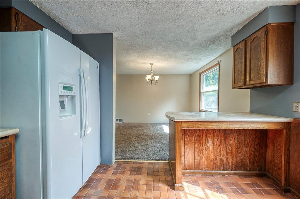 210 Swiontek Road Aliquippa, PA 15001 - Photo 7 of 28 a view of a hallway with entryway and window