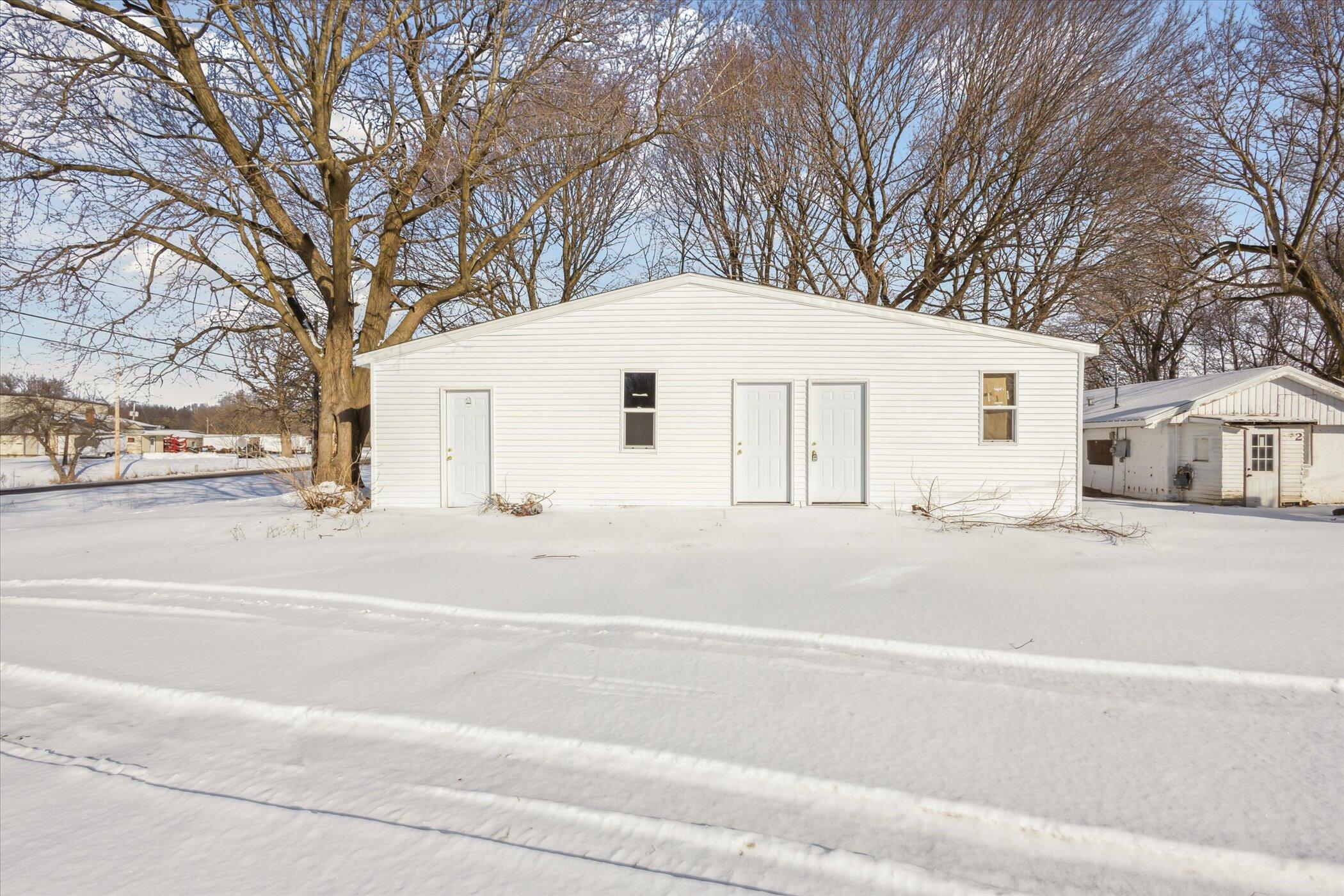 7182 Whites Bridge Road Belding, MI 48809 - Photo 1 of 14 Front Main
