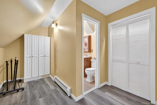 a view of a bathroom with a sink and a mirror