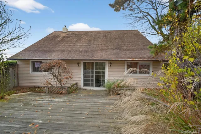 a front view of a house with yard