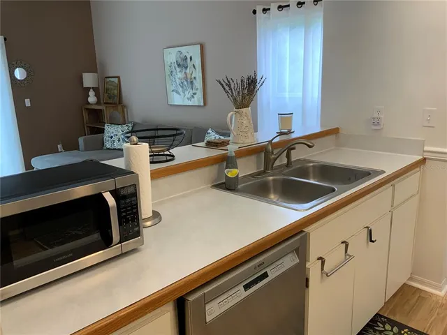 a view kitchen with sink and stove