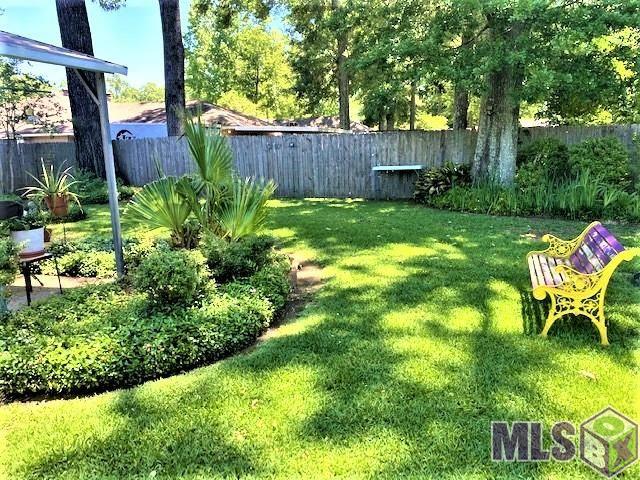 13706 Cypress Ridge Avenue Baton Rouge, LA 70817 - Photo 35 of 41 Backyard with Lush Landscaping