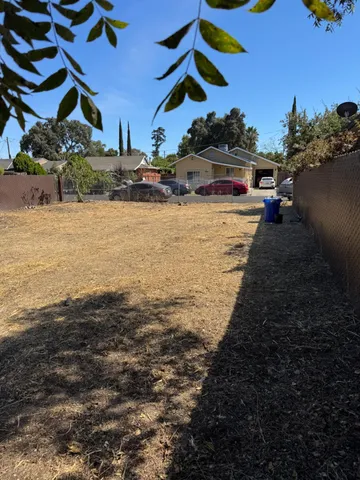 a view of a backyard of a house
