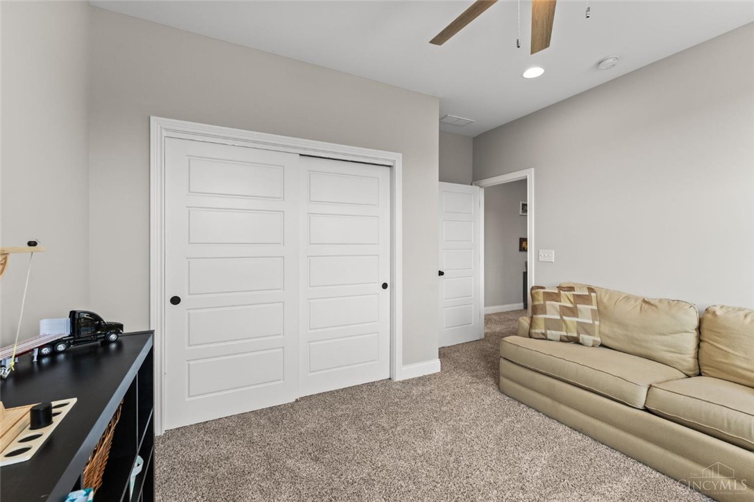 2425 Middleboro Road Clarksville, OH 45113 - Photo 75 of 91 This versatile room features neutral tones, a textured carpet, and ample natural light.