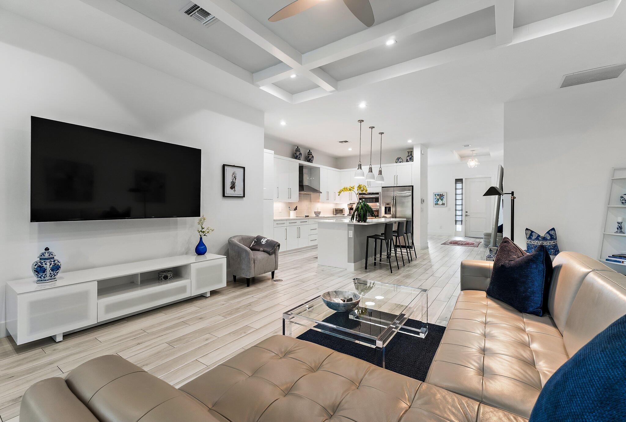 2908 Gin Berry Way West Palm Beach, FL 33401 - Photo 13 of 70 a living room with furniture and a flat screen tv