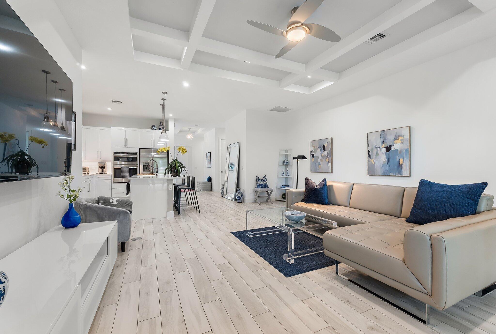 2908 Gin Berry Way West Palm Beach, FL 33401 - Photo 17 of 70 a living room with furniture and a wooden floor