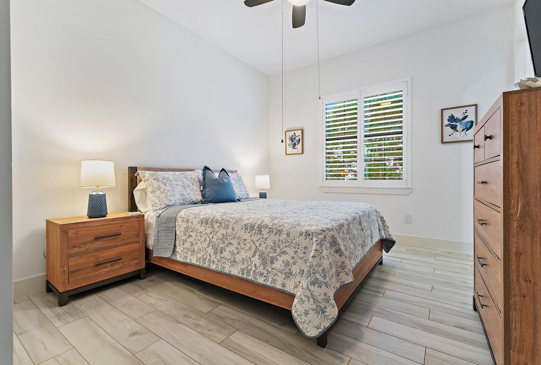 2908 Gin Berry Way West Palm Beach, FL 33401 - Photo 27 of 70 a bedroom with bed and window